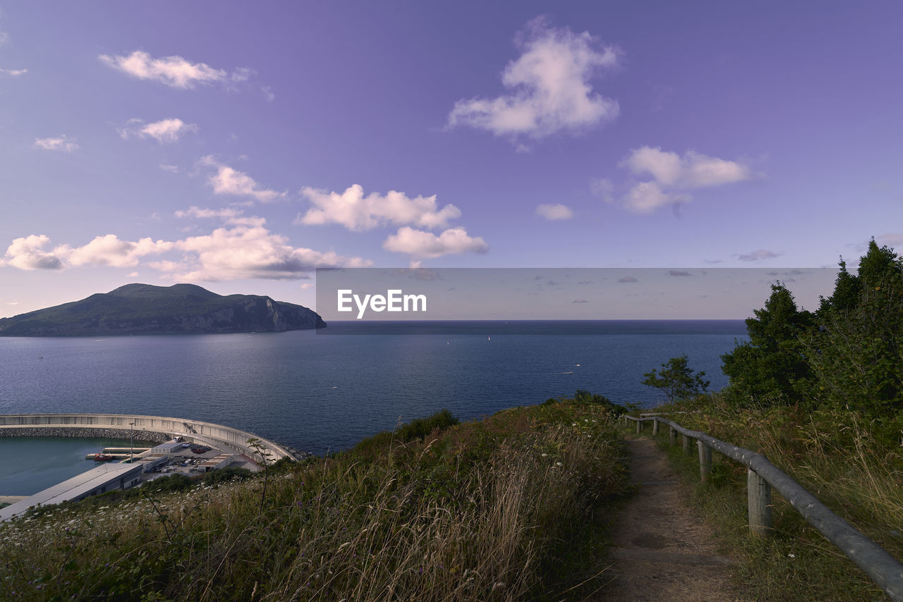 water, sky, sea, coast, land, body of water, scenics - nature, nature, cloud, beach, environment, horizon, shore, beauty in nature, travel, landscape, travel destinations, plant, ocean, bay, coastline, tourism, tranquility, no people, reservoir, holiday, mountain, transportation, trip, vacation, outdoors, tranquil scene, tree, island, reflection, architecture, terrain, horizon over water, blue, seascape, grass, cliff, summer, bay of water, day, non-urban scene