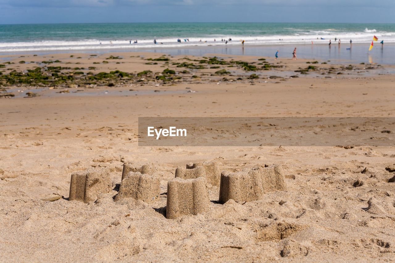 Scenic view of beach against sky