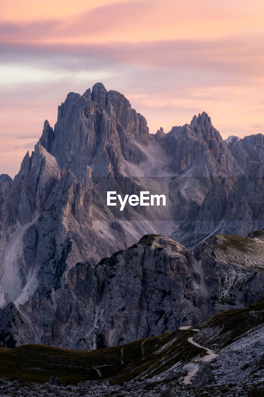 scenic view of landscape against sky during sunset