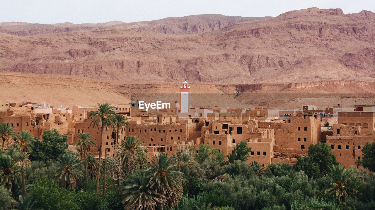 High angle view of old buildings against mountains