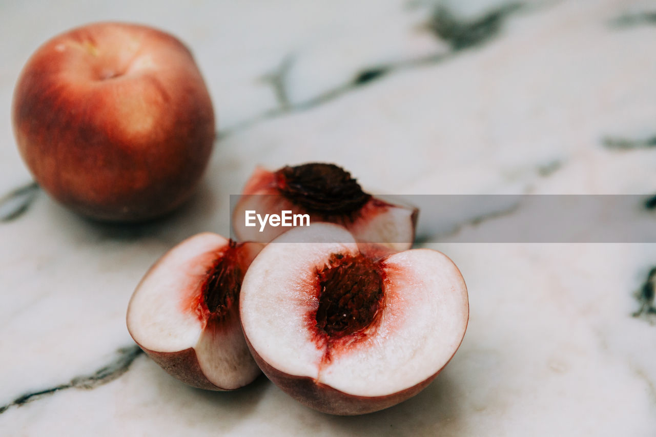 High angle view of peaches on table