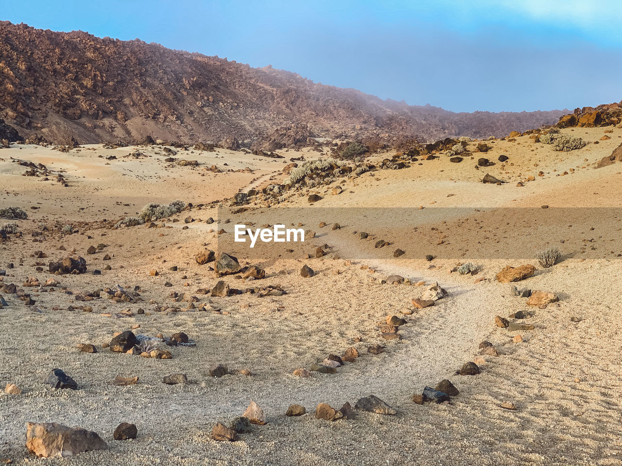 Scenic view of desert against sky