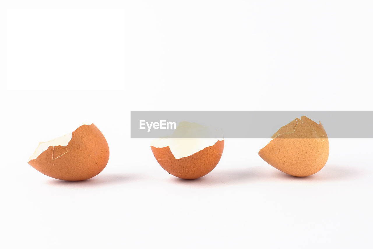 Close-up of eggshell against white background