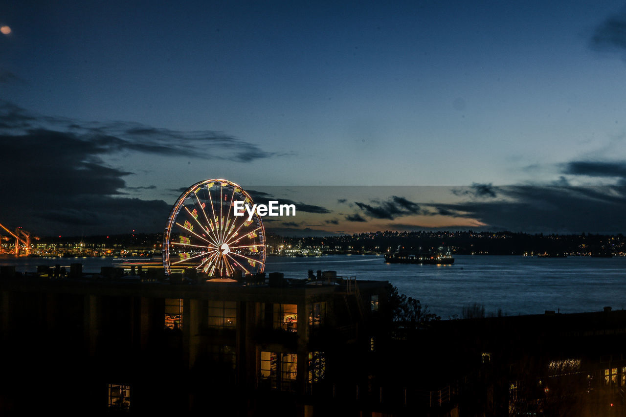 Scenic view of sea against sky at night