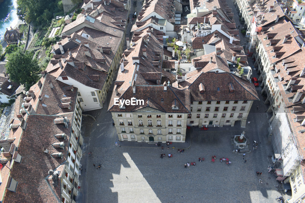 High angle view of street amidst buildings in town