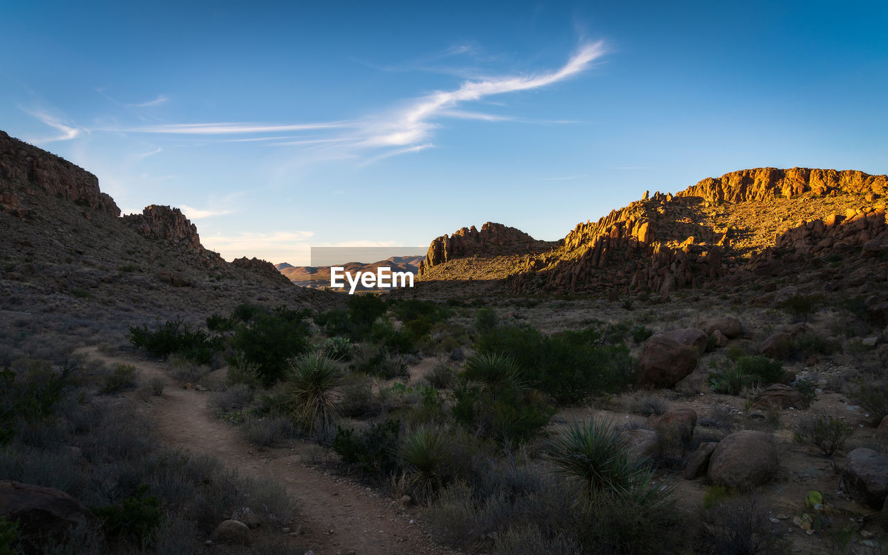 Scenic view of rocky mountains against sky in big bend national park - texas