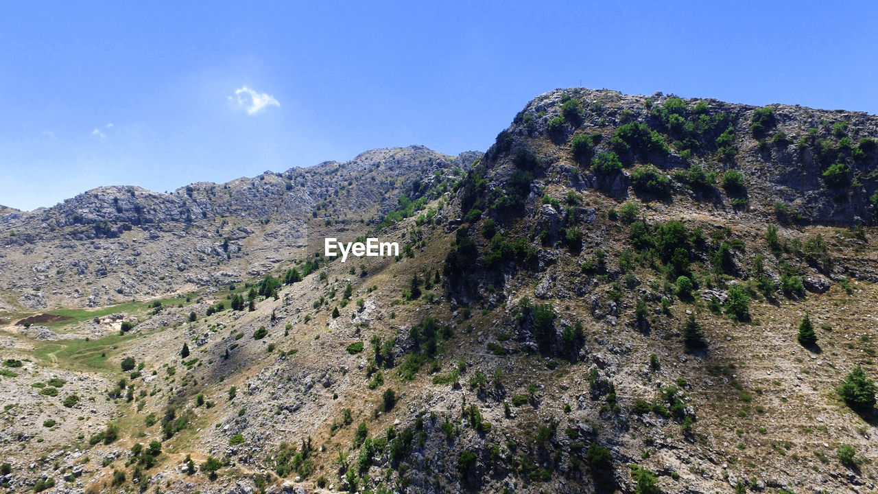 Scenic view of mountains against clear sky