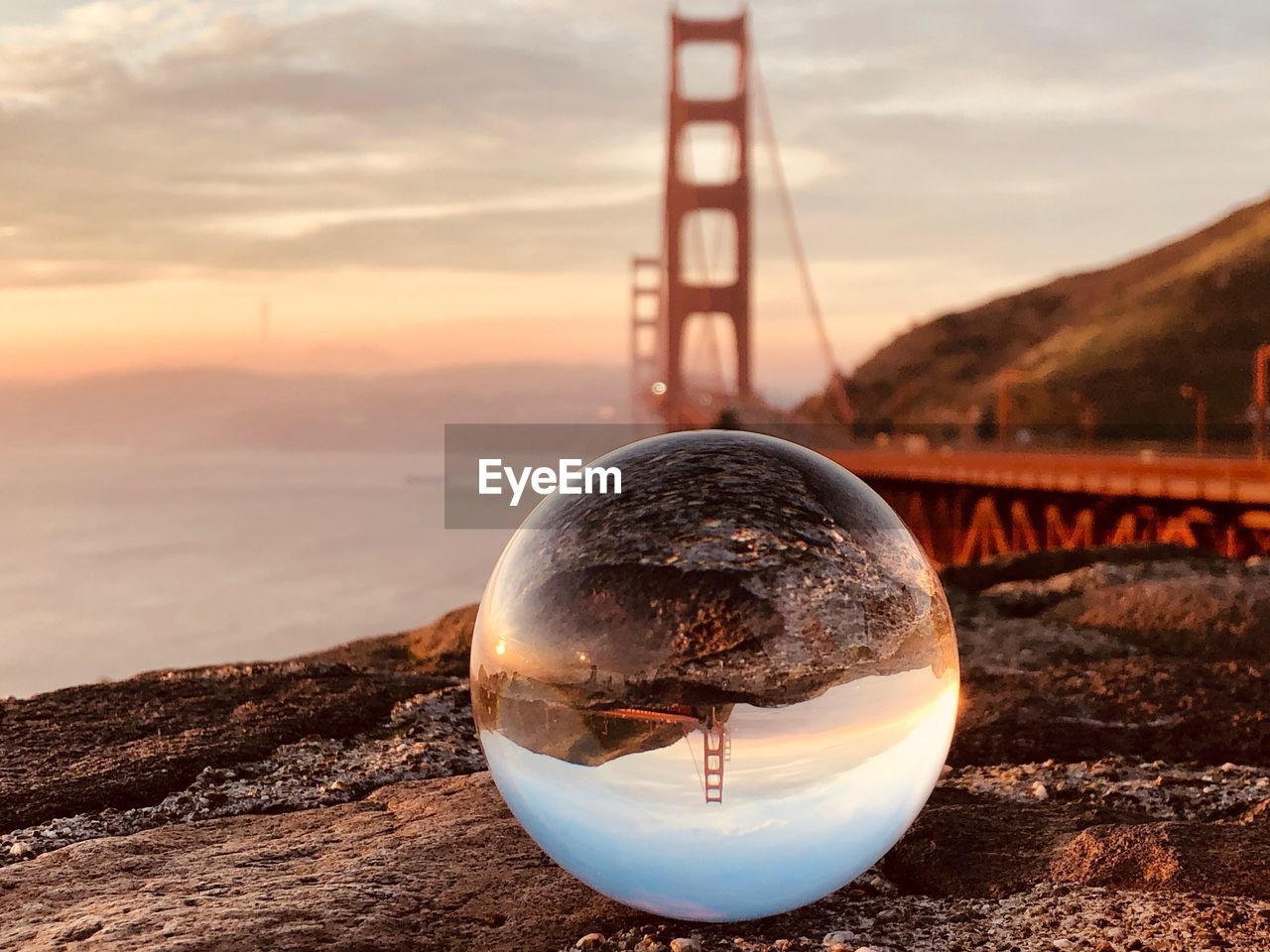 CLOSE-UP OF CRYSTAL BALL ON WATER