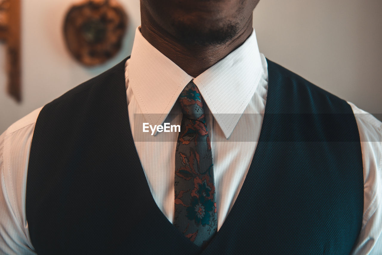 adult, one person, men, clothing, formal wear, indoors, business, tuxedo, person, front view, portrait, tie, fashion, menswear, necktie, close-up, fashion accessory, young adult, businessman