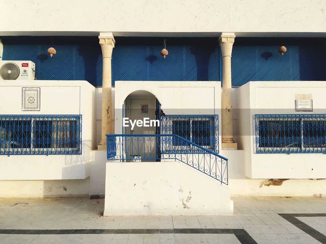 WHITE BUILDING WITH CLOSED DOOR