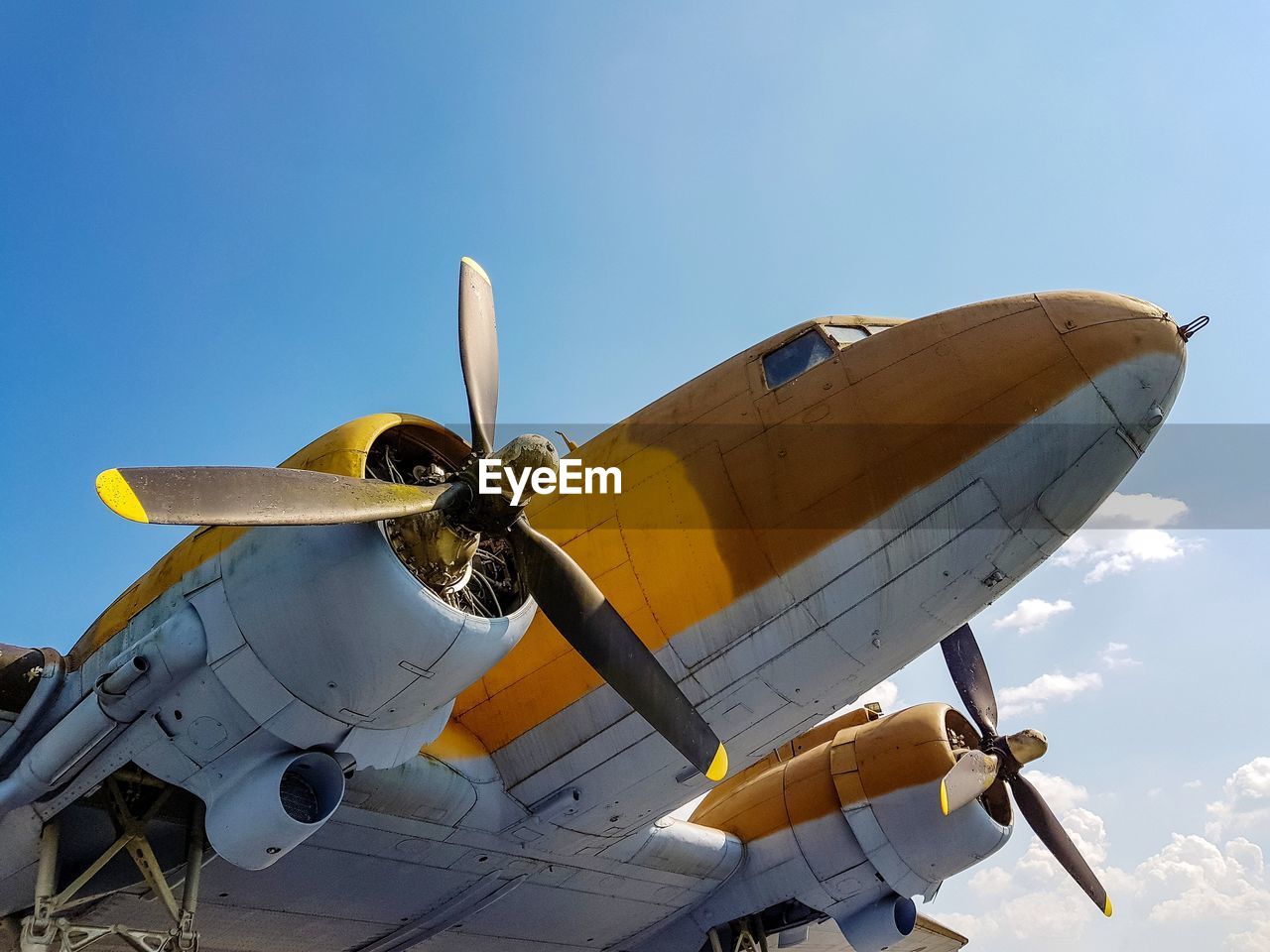 Old ww2 aircraft against blue sky