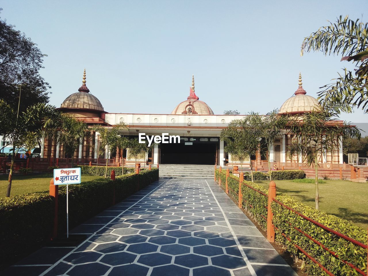 ENTRANCE OF TEMPLE AGAINST BUILDING