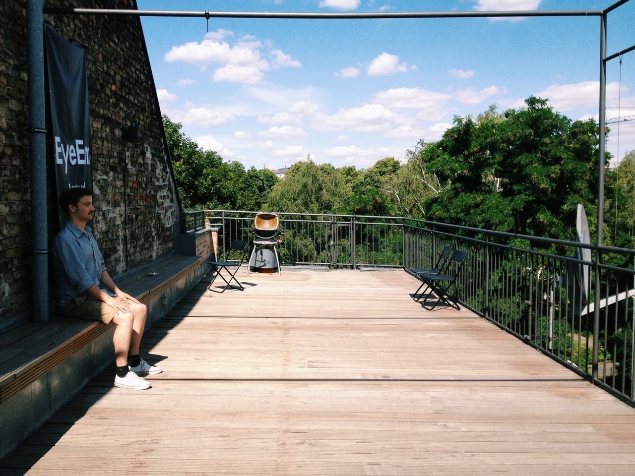 Man contemplating on roof