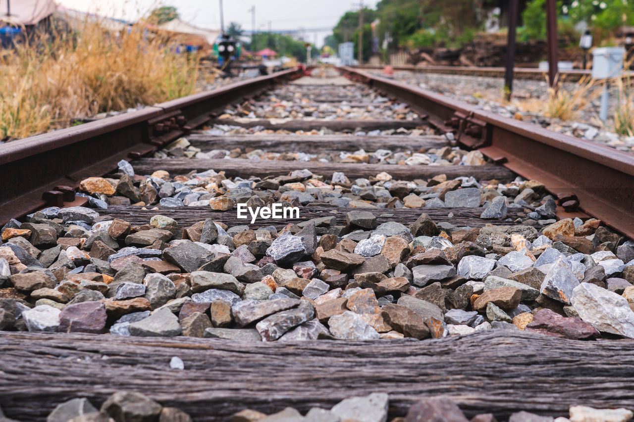 SURFACE LEVEL OF RAILROAD TRACK ALONG SIDE VIEW