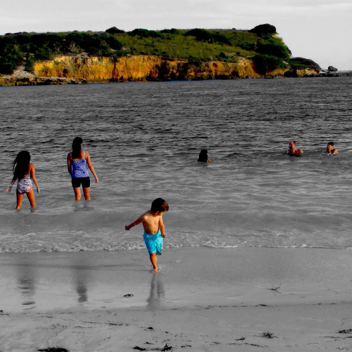 WOMAN ENJOYING AT BEACH