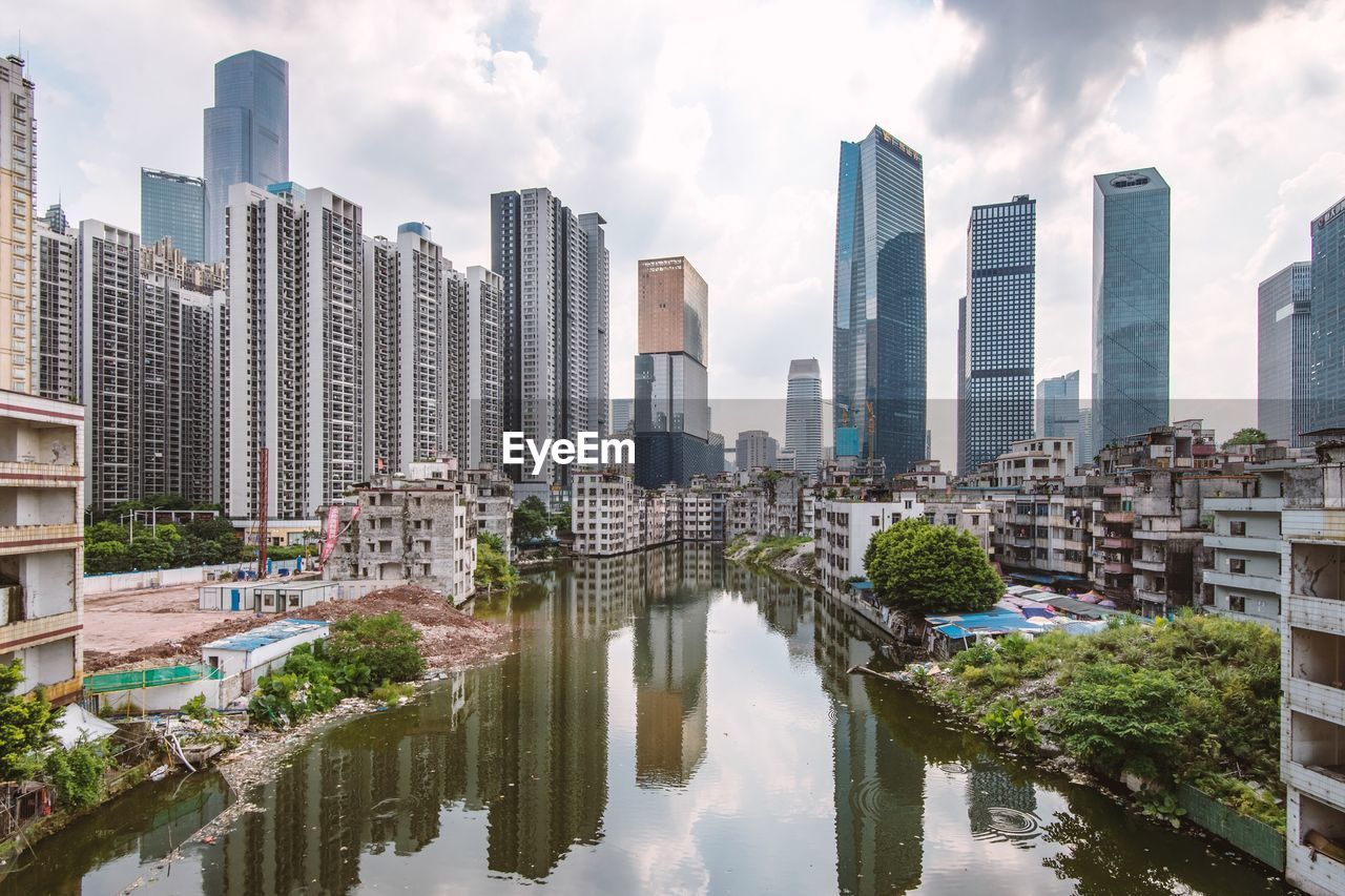 Skyscrapers in city against sky