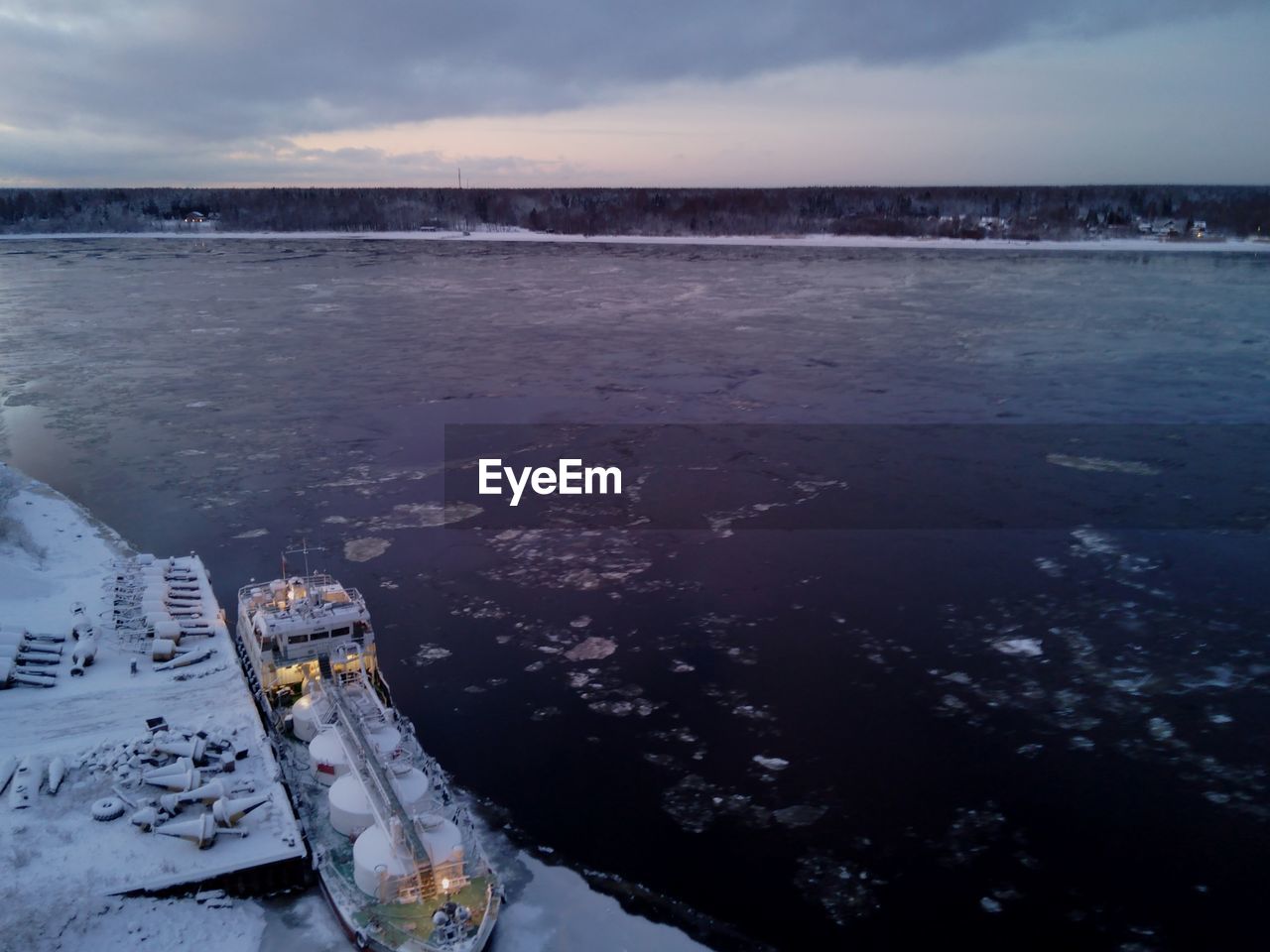 Scenic view of sea against sky during winter