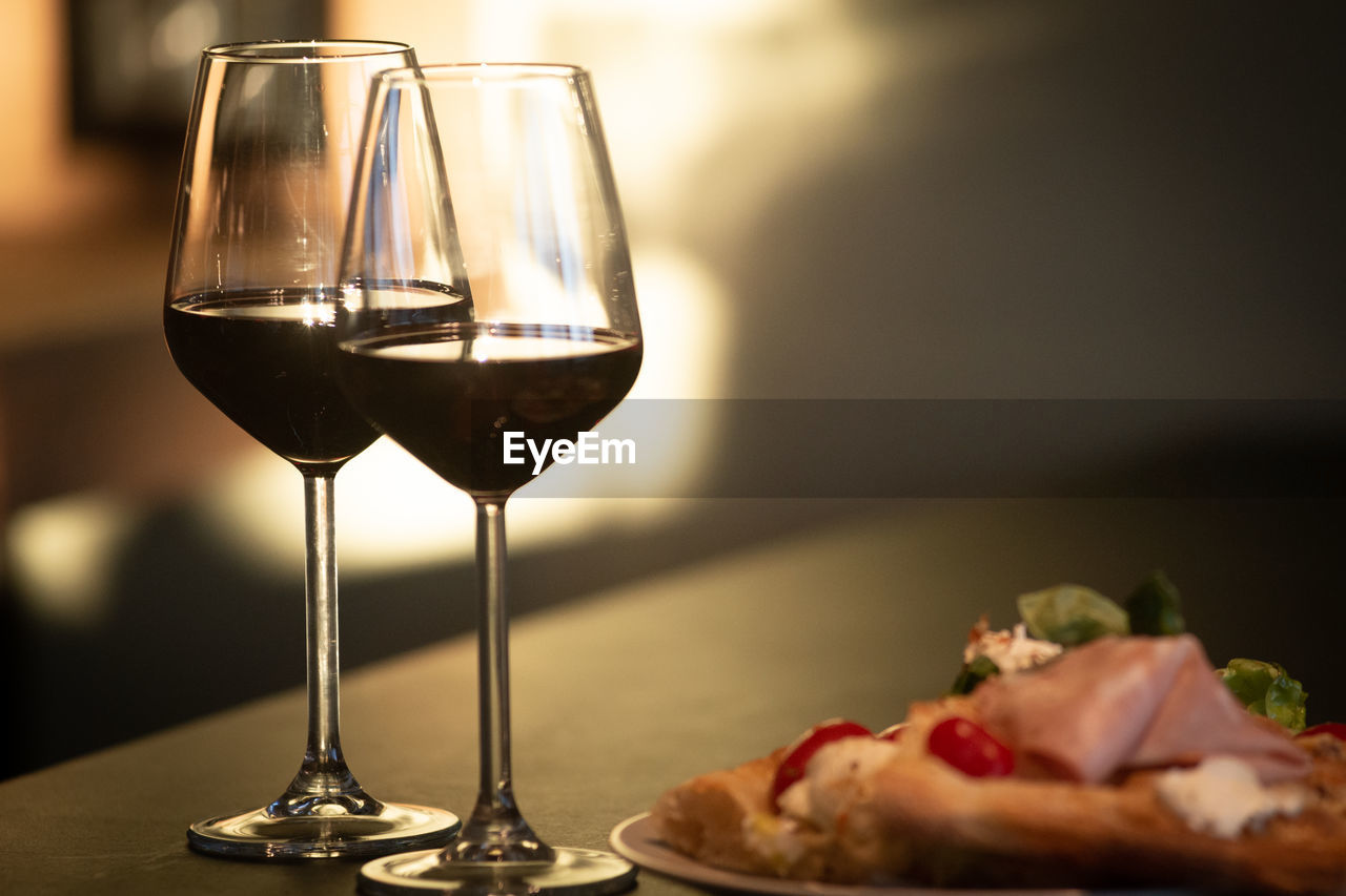 Close-up of wine in glass on table