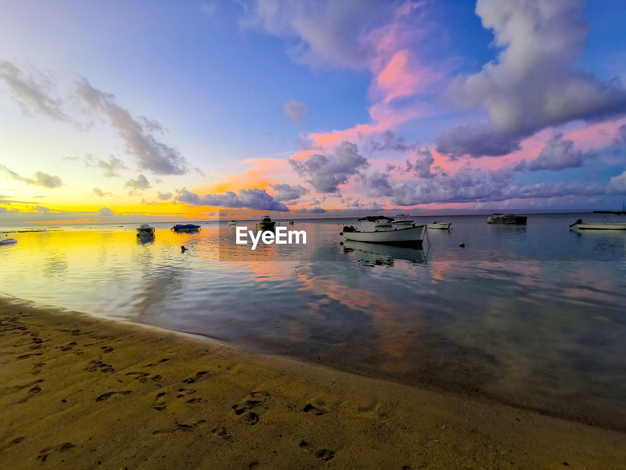 Scenic view of sea against sky during sunset