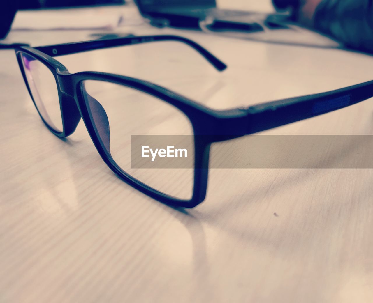 Close-up of eyeglasses on table