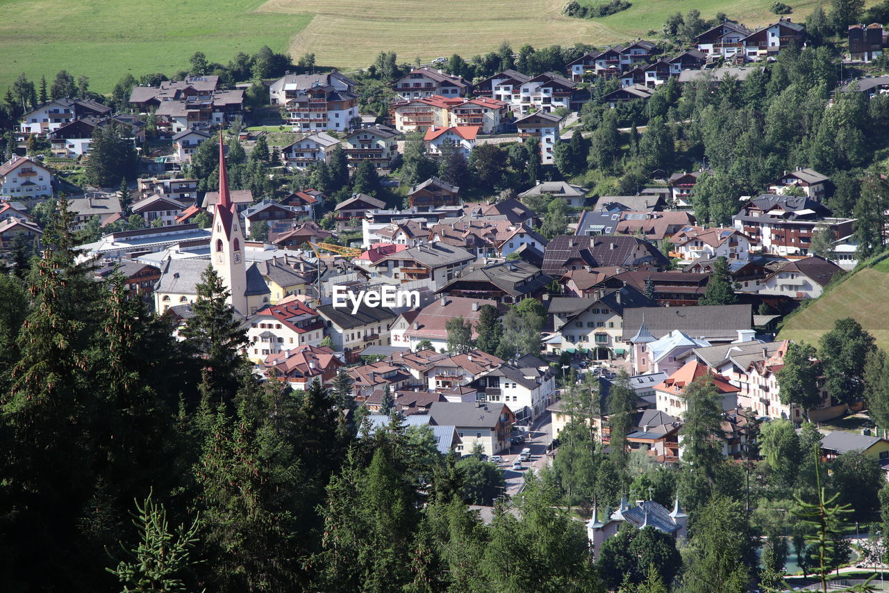 High angle view of townscape and trees in town