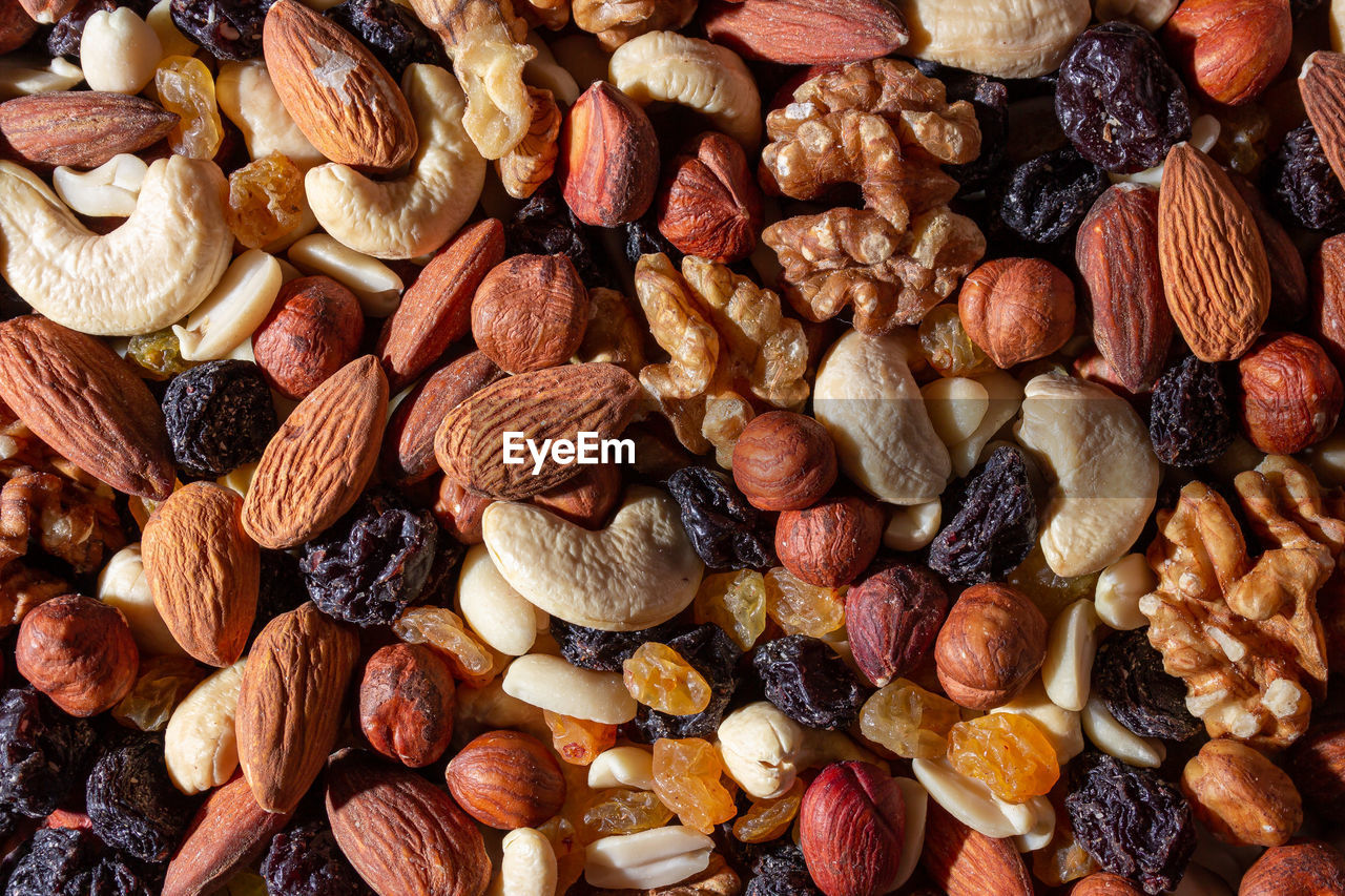 food and drink, food, full frame, produce, backgrounds, nut, large group of objects, nut - food, dried fruit, abundance, healthy eating, wellbeing, almond, no people, close-up, freshness, brown, still life, dried food, indoors, variation, fruit, directly above