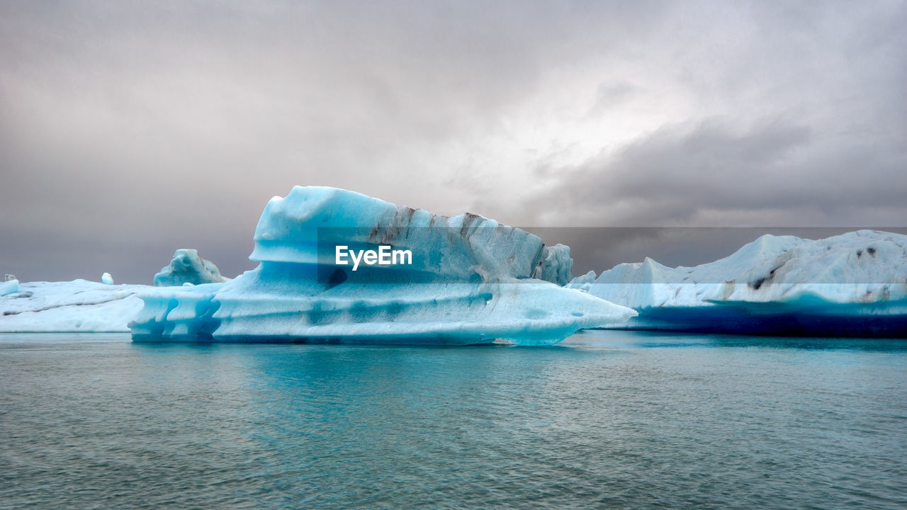 Scenic view of sea against sky during winter