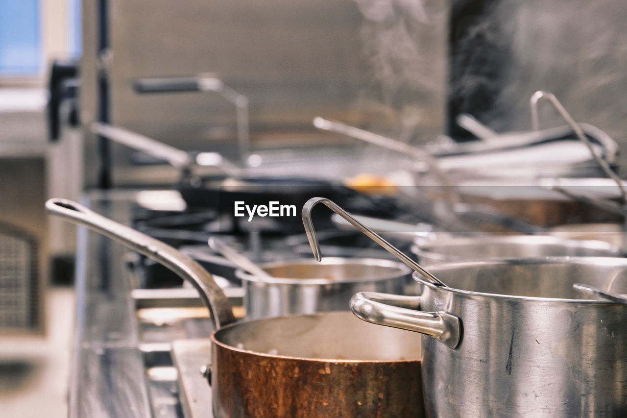 Close-up of pans in the restaurant kitchen 