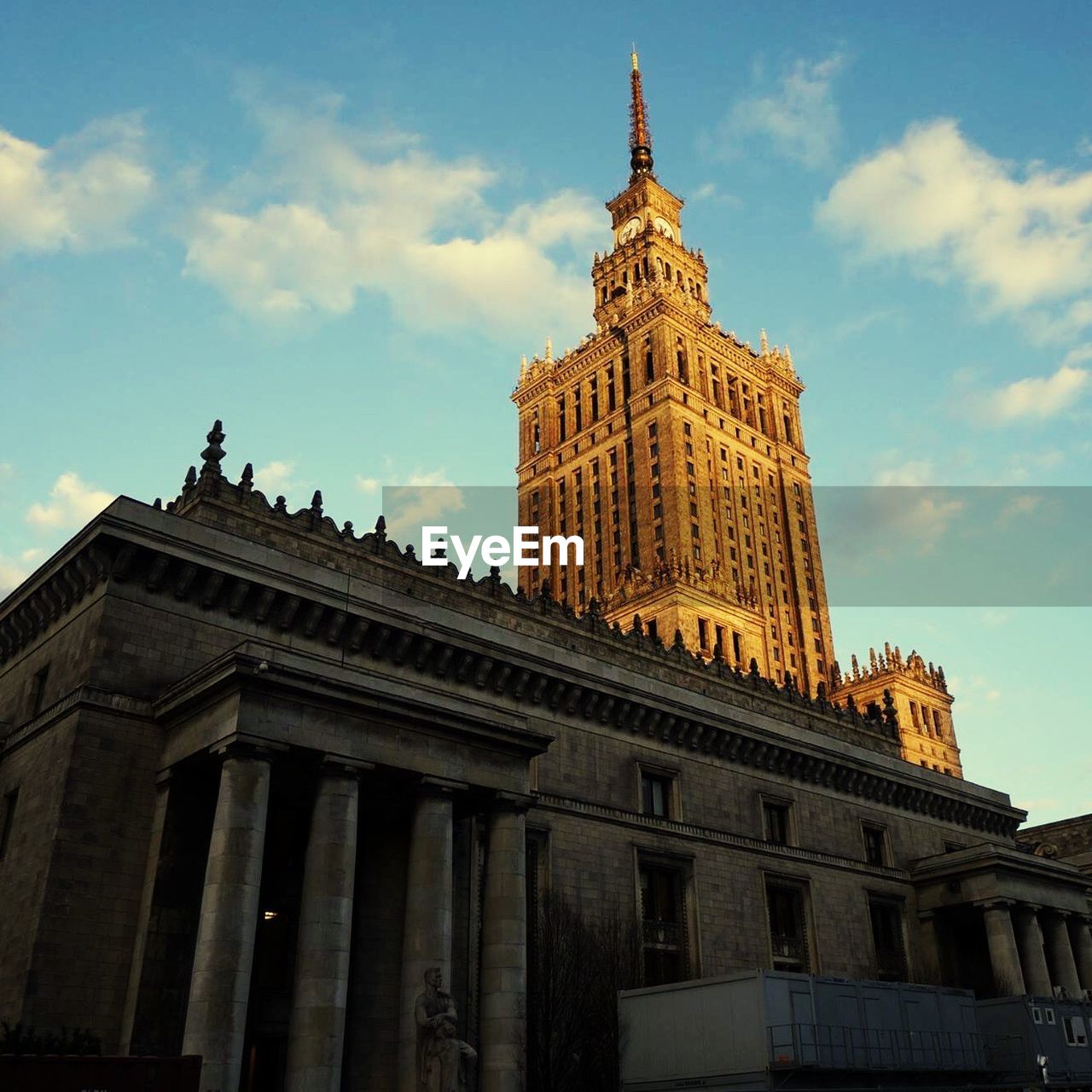 Palace of culture and science against sky in city