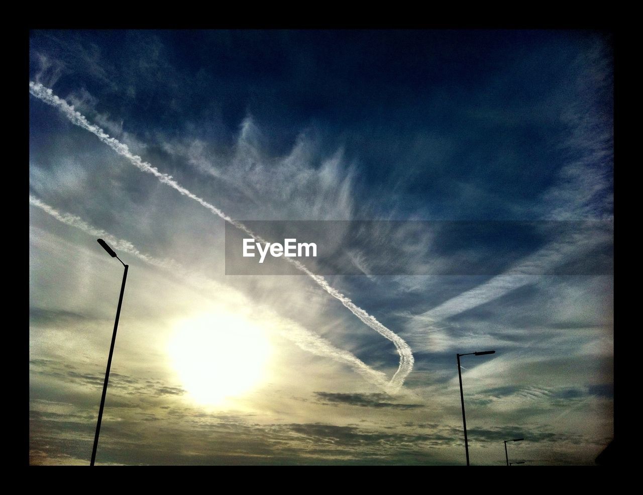 LOW ANGLE VIEW OF POWER LINES AGAINST SKY