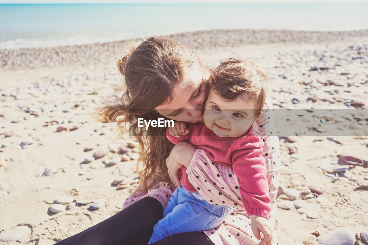 Mother and daughter at beach