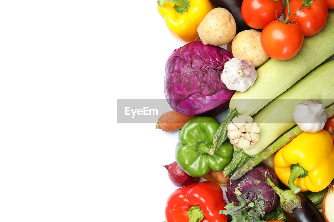 food and drink, vegetable, food, healthy eating, freshness, wellbeing, variation, fruit, tomato, multi colored, onion, pepper, studio shot, bell pepper, produce, raw food, organic, ingredient, indoors, root vegetable, still life, large group of objects, pepper - vegetable, no people, yellow, carrot, cut out, copy space, radish, red, capsicum, yellow bell pepper, cherry tomato, dish, spice, zucchini, vegetarian food, red bell pepper, cucumber, directly above, abundance, high angle view, herb, green, eggplant, yellow pepper