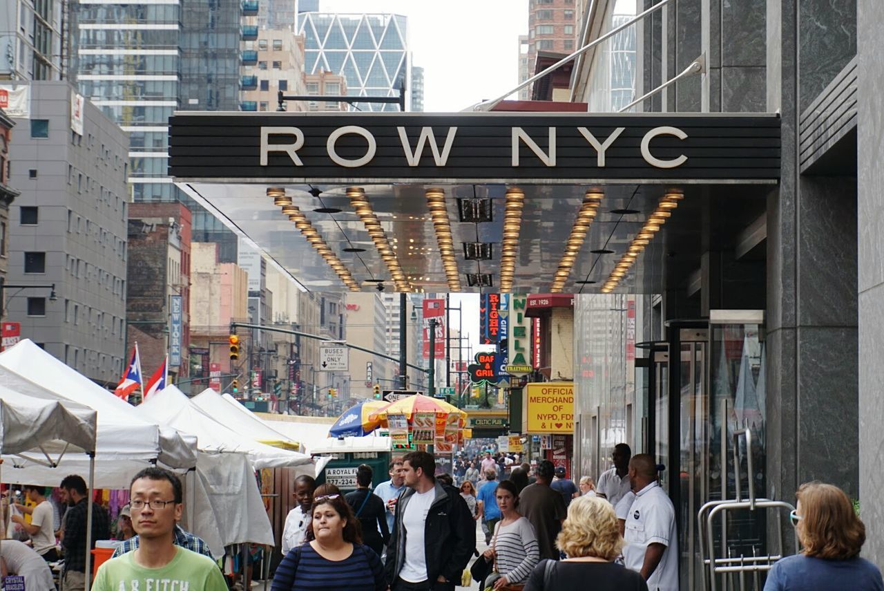 PEOPLE WALKING IN CITY