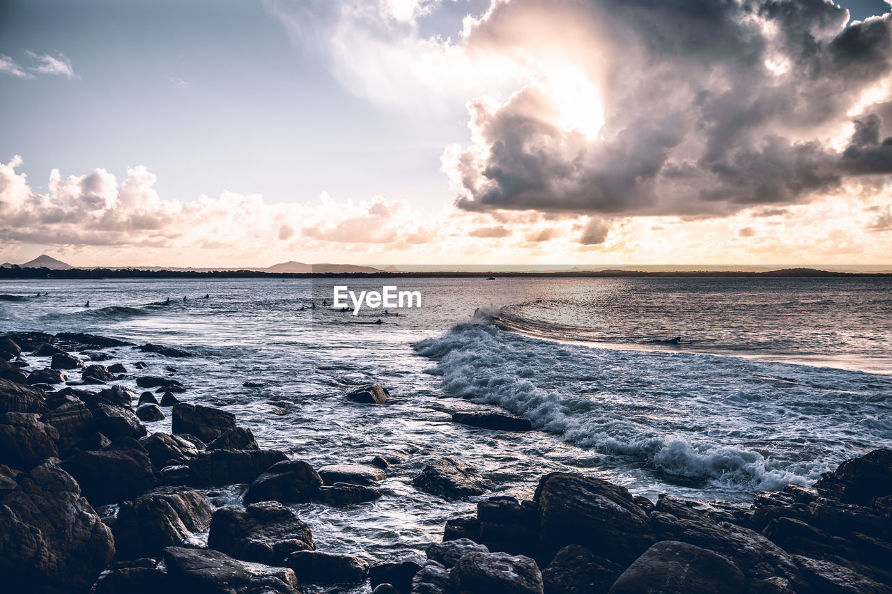 SCENIC VIEW OF SEA DURING SUNSET