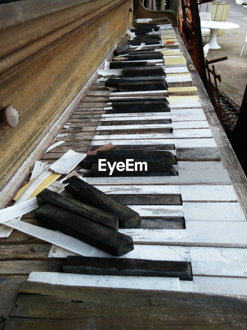 Close-up of damaged piano keys