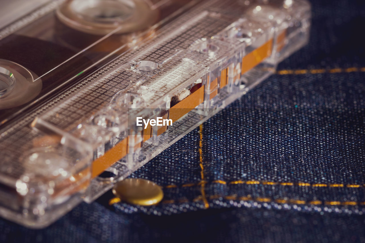 Close-up of cassette on denim