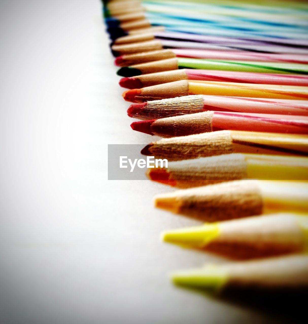 Close-up of colored pencils on table