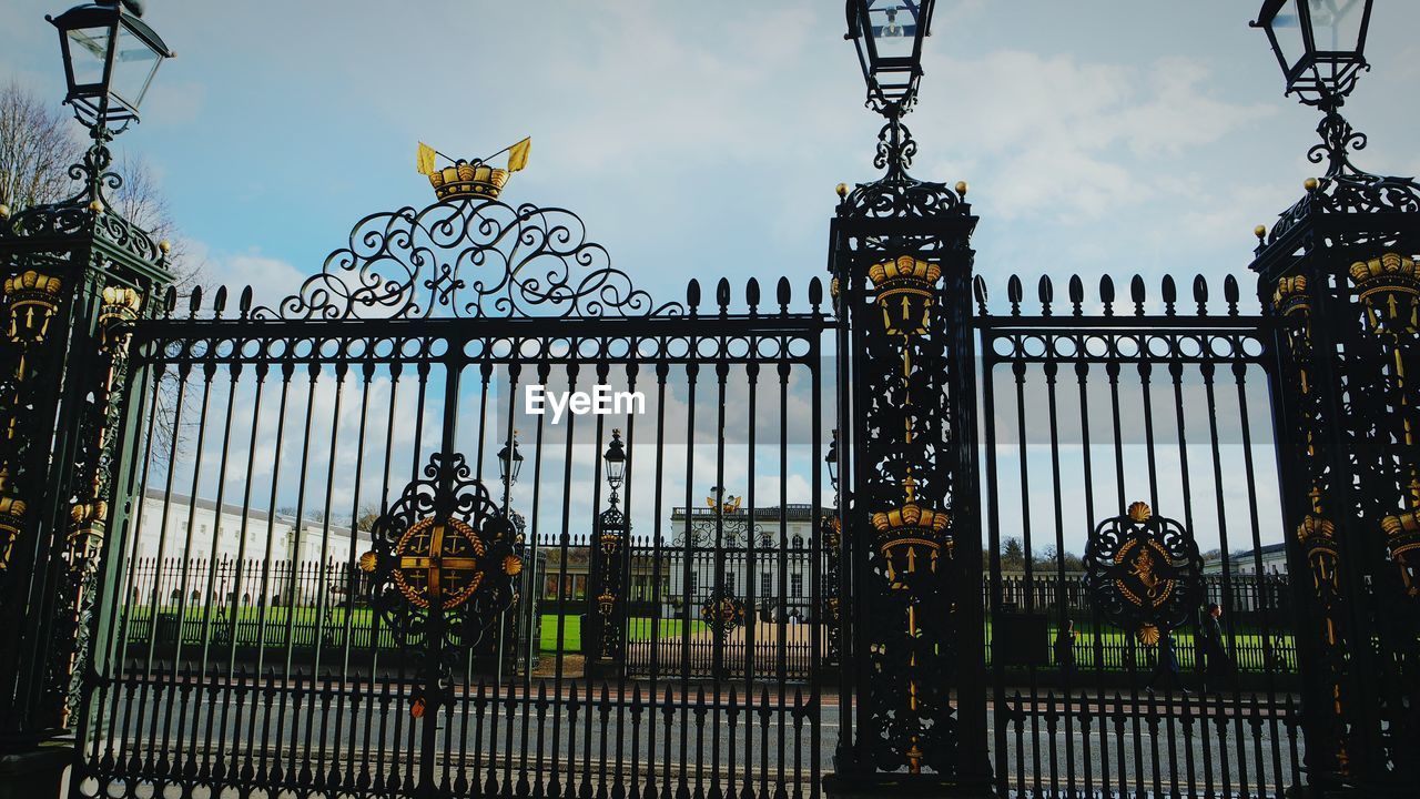 METAL GATE AGAINST BUILDINGS