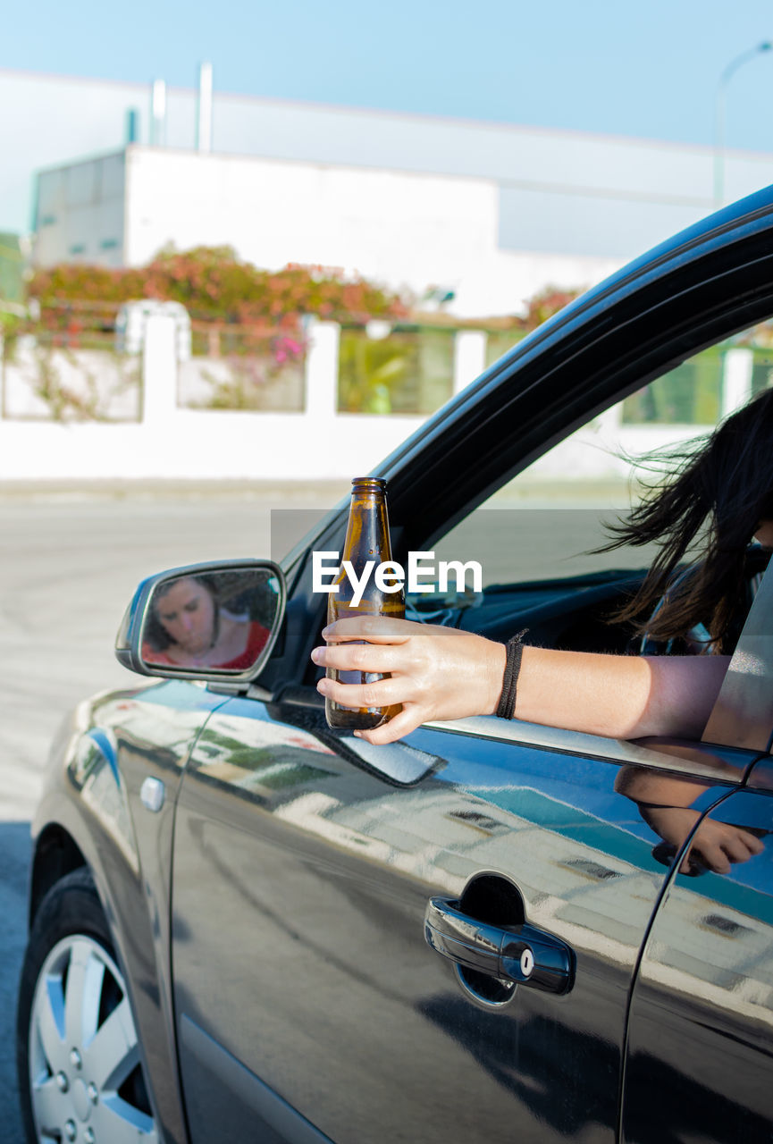 MAN SITTING IN CAR