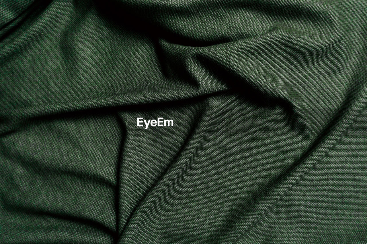 textile, backgrounds, full frame, textured, green, crumpled, pattern, no people, clothing, material, close-up, outerwear, wrinkled, indoors, black, jacket, bed, rippled, linen, abstract