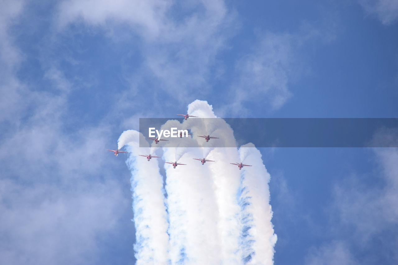 LOW ANGLE VIEW OF AIRPLANE IN SKY