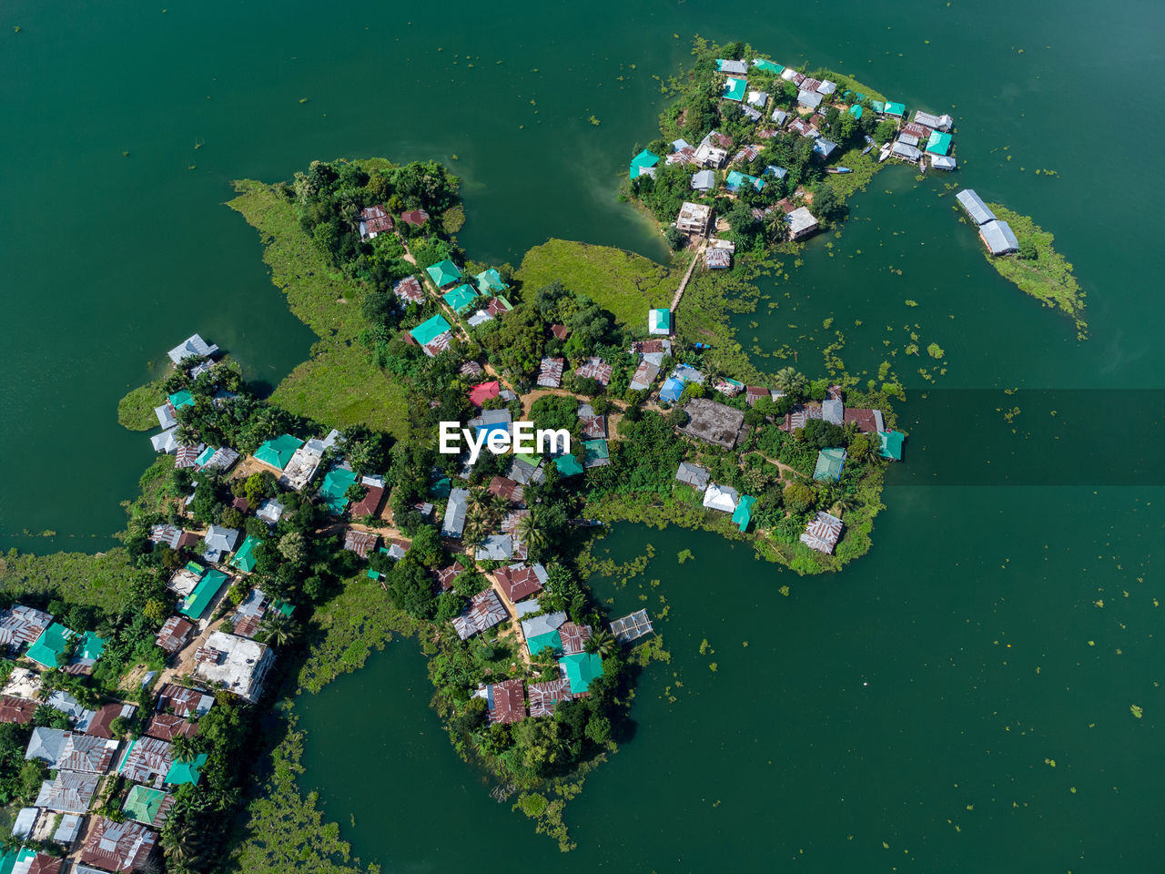 HIGH ANGLE VIEW OF SEA BY BUILDINGS