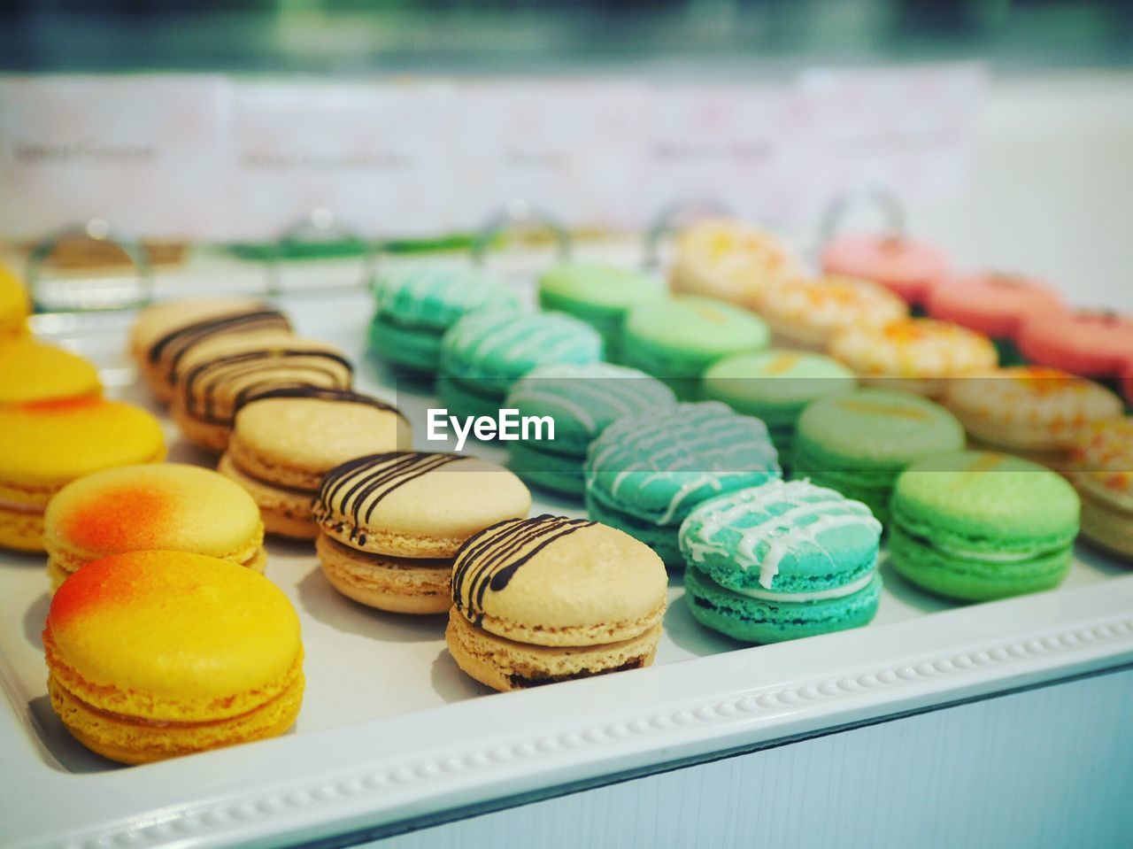 Close-up of colorful macaroons on tray