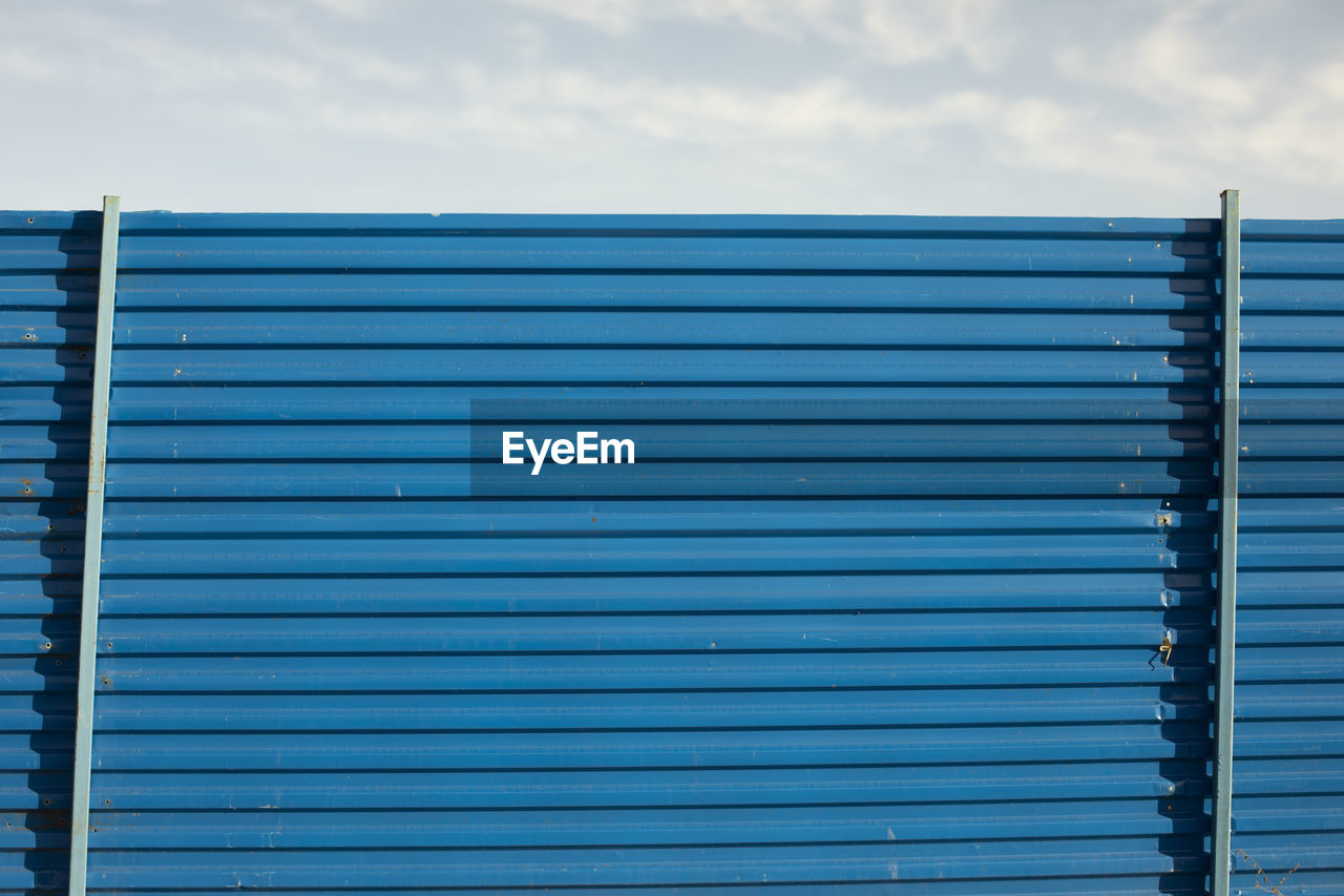 low angle view of metallic gate