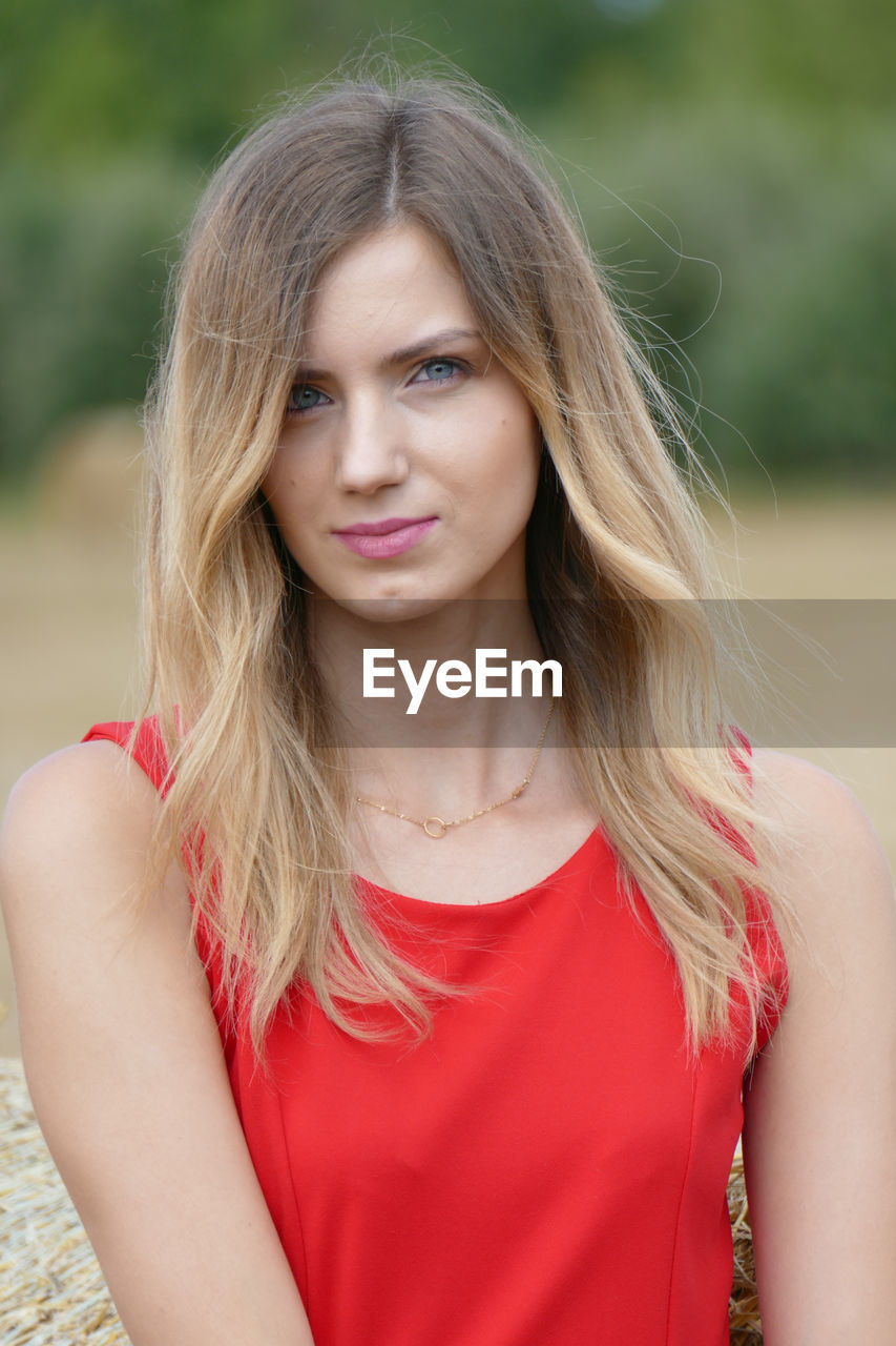 Portrait of beautiful young woman with brown hair