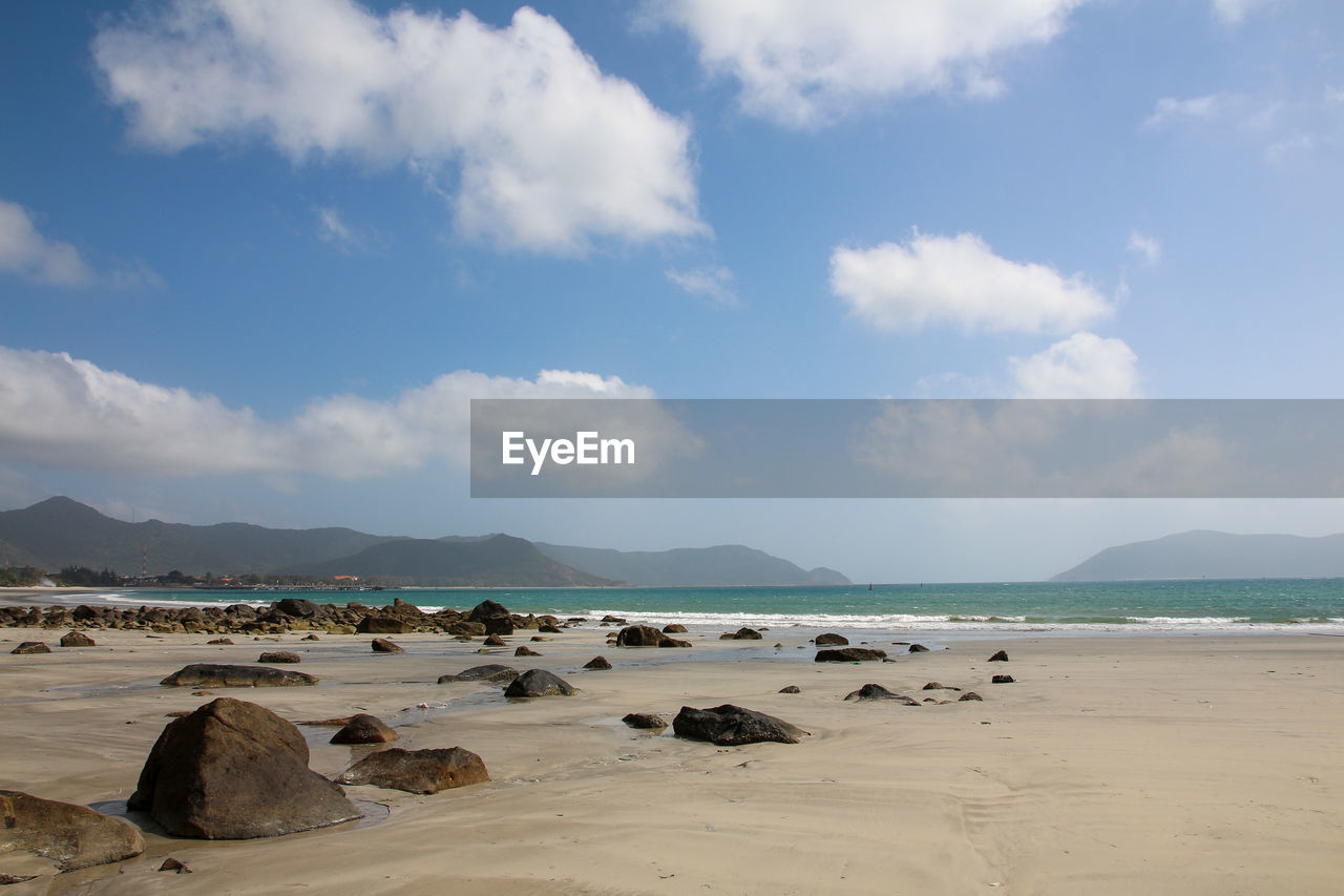 Scenic view of beach against sky