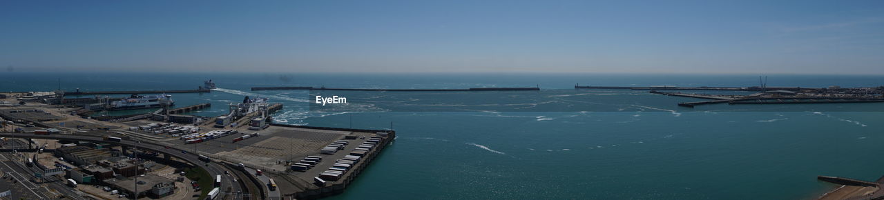 High angle view of sea against blue sky