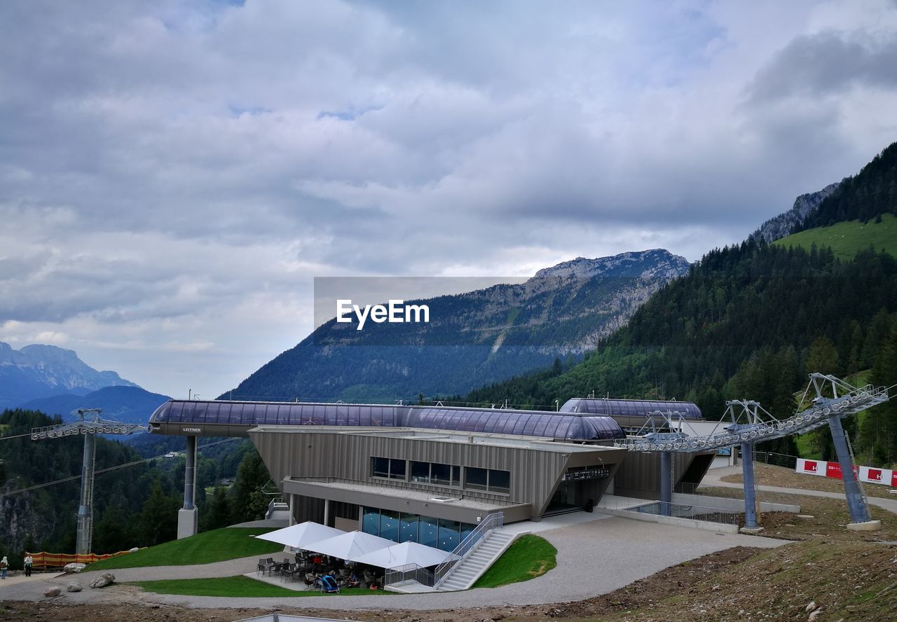 BUILT STRUCTURE WITH MOUNTAIN IN BACKGROUND