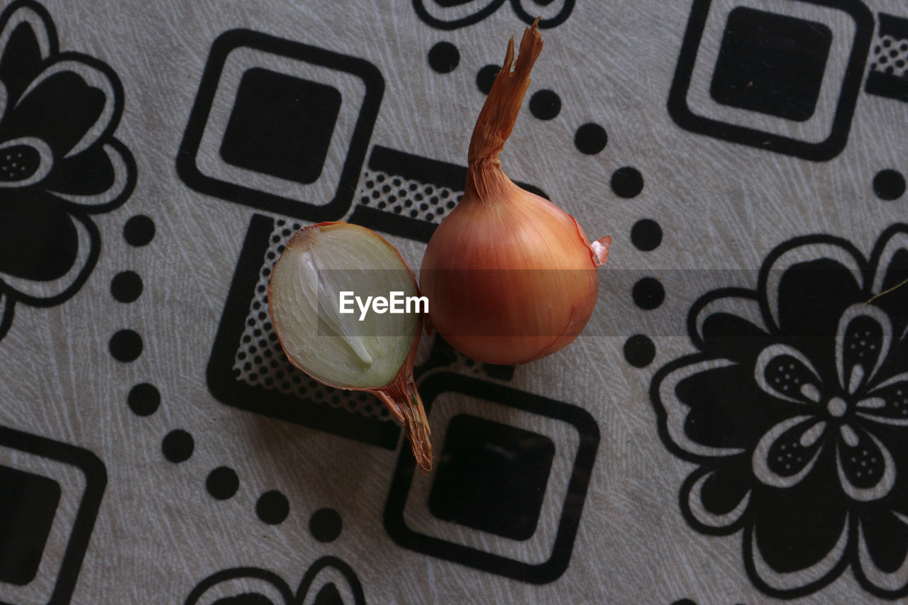 food, food and drink, black, indoors, still life photography, no people, high angle view, still life, vegetable, technology, onion, pattern, art, directly above, healthy eating, freshness, brown, wellbeing, garlic, spice, close-up, wireless technology