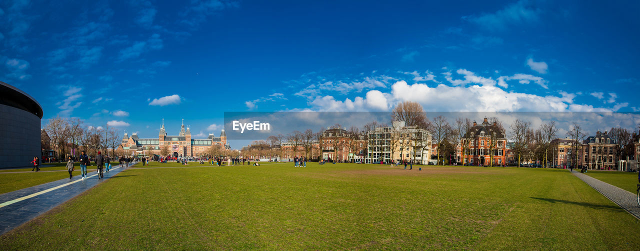 PANORAMIC VIEW OF CITY BUILDINGS AGAINST SKY